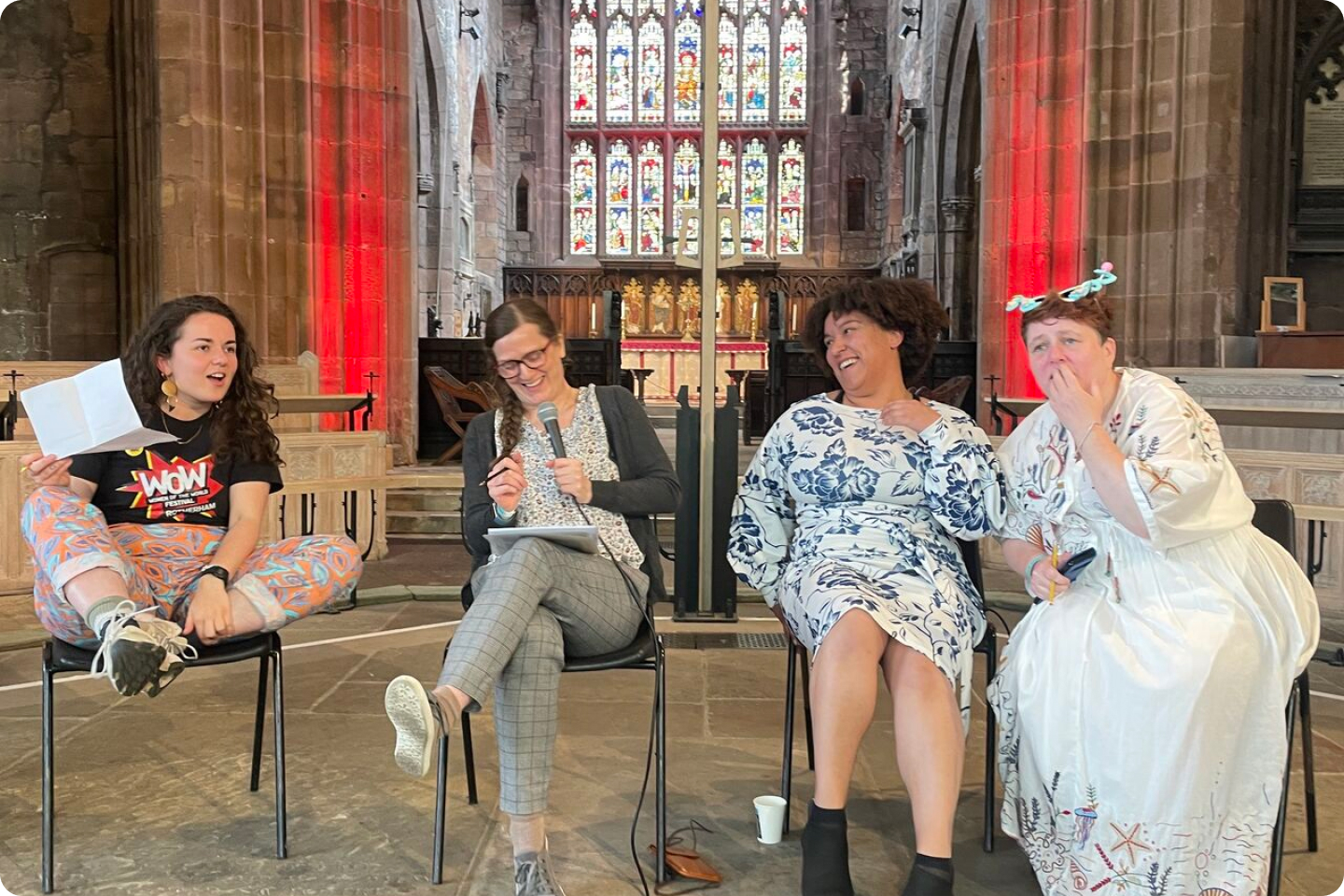 Photo of Georgia speaking on a panel on Neurodiversity and Mental Health at The WOW Foundation festival in Rotherham. Discussing such important topics with the amazing host, Neath Champion-Shorr and fellow panellists Jennifer Booth and Vicky Morris. Photo taken from Linkedin 
