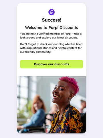 Success message for Purpl Discounts membership verification, featuring a smiling woman in a floral top and vibrant pink hair in a bright, inclusive community setting.