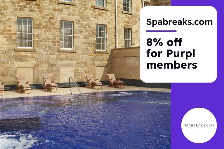 An outside pool by a stone building with Georgian windows and the text spa breaks. com 8% off for Purpl members