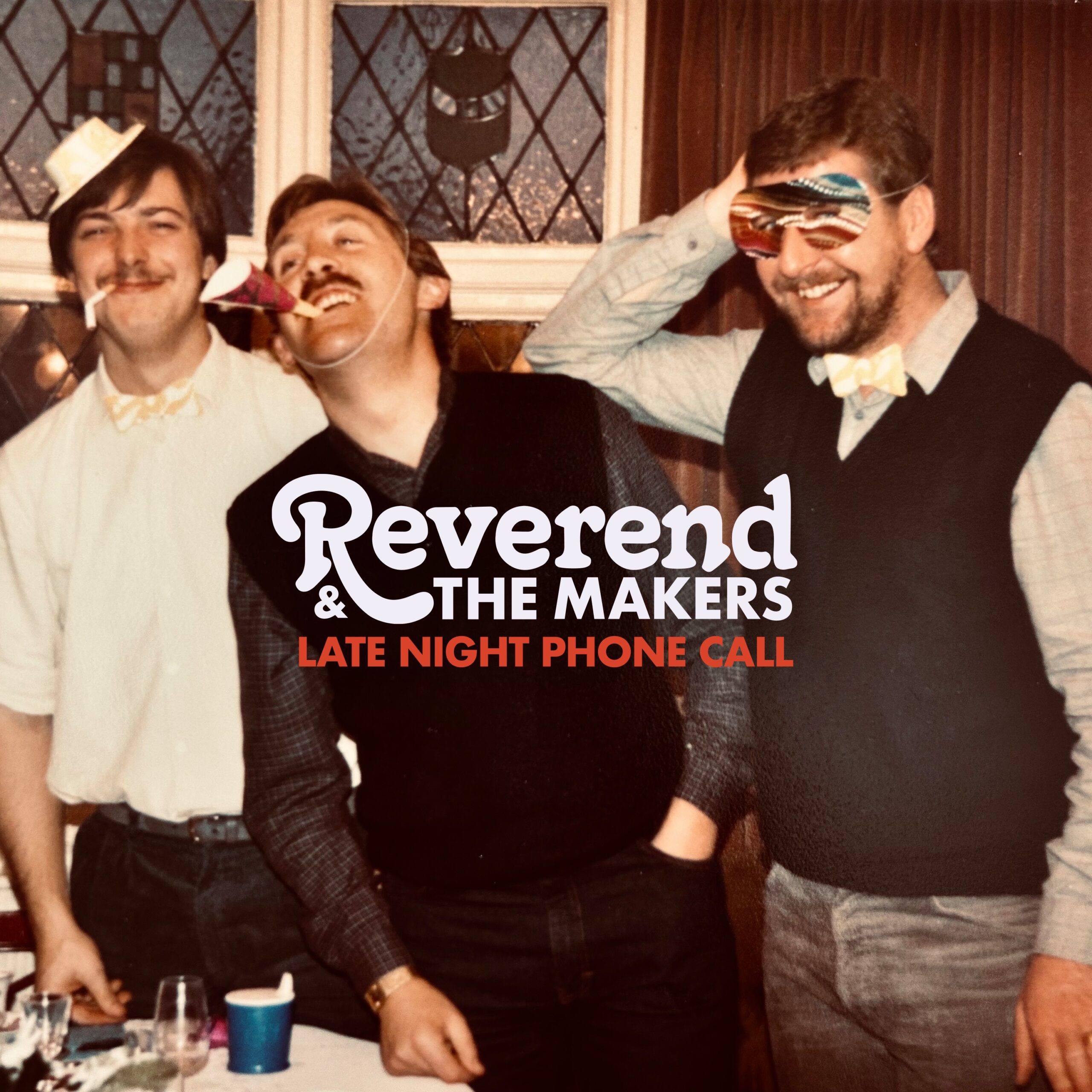 Single cover artwork for Reverend and the Makers Christmas single Late night phone call with three men at a christmas party that looks like it is from the 80s