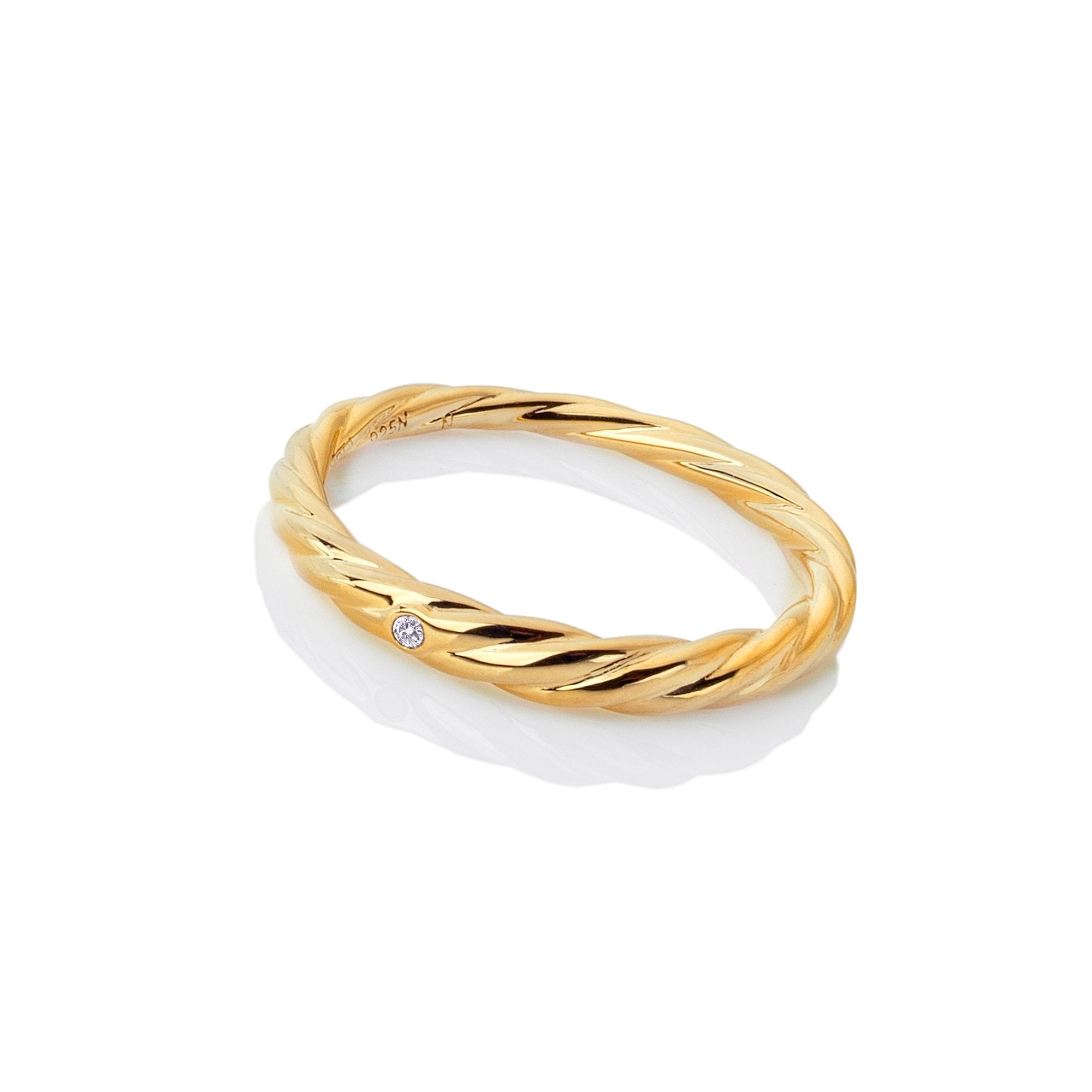 a gold ring with a diamond in it from hot diamonds disabled discount code