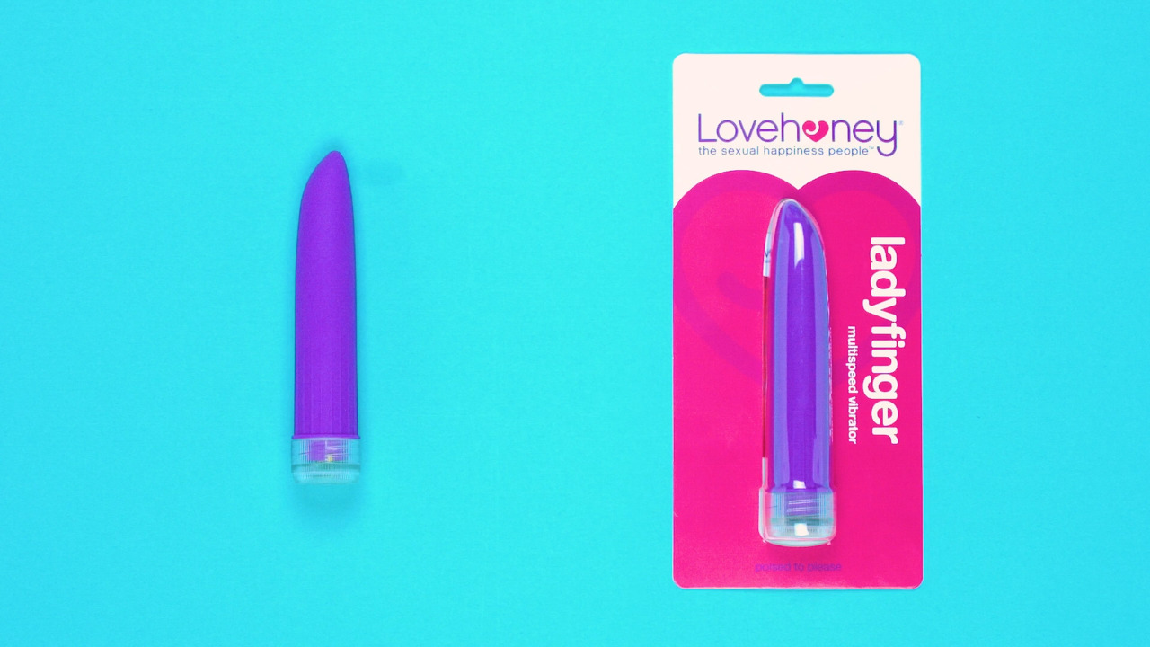 The lovehoney ladyfinger vibrator on a blue background