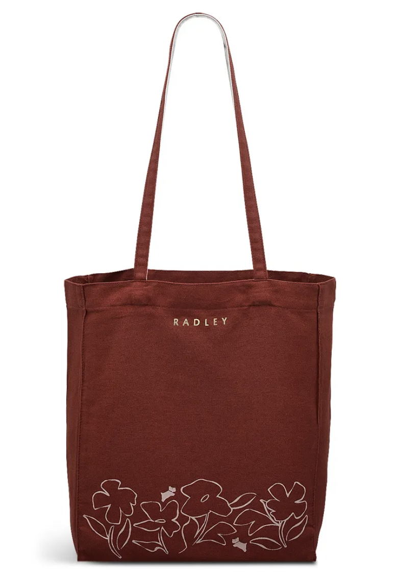 Radley tote bag in rust colour with a disabled discount code from purpl