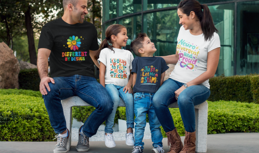 A family of a mum, dad and two young children are sat on a bench wearing differently perfect tshirts