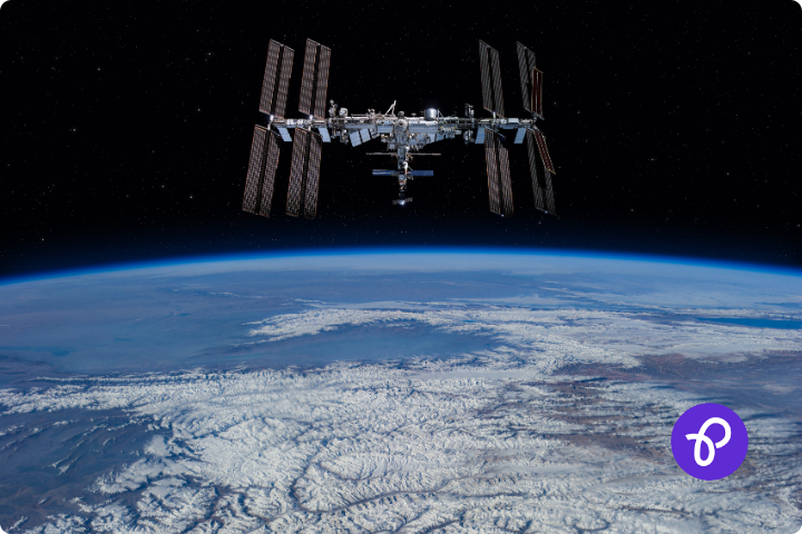 Image of the international space station and the earth below it